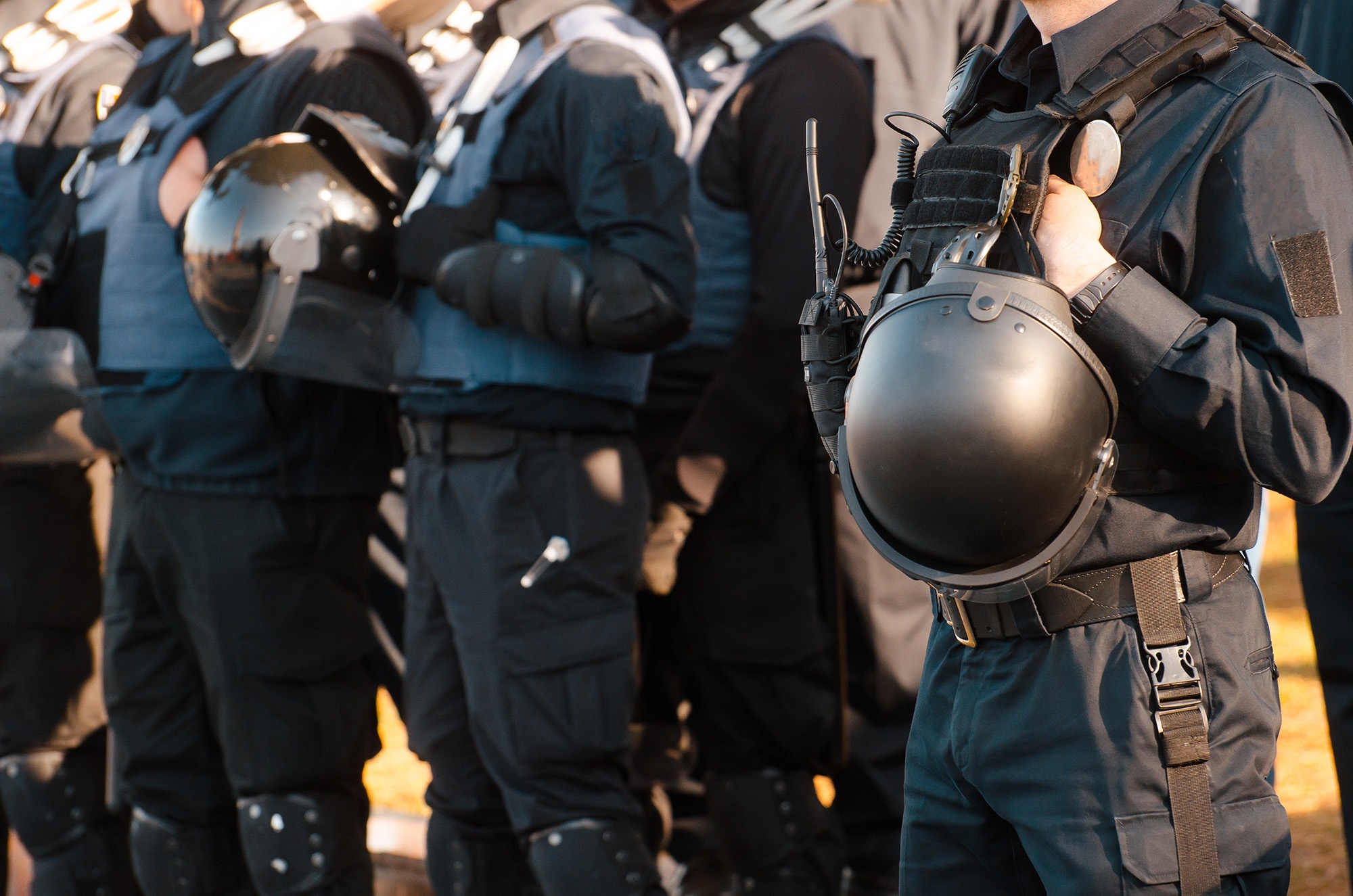 security detail An image of armed security detail to represent Kerberos International Security Division armed guards services they provide for customers.